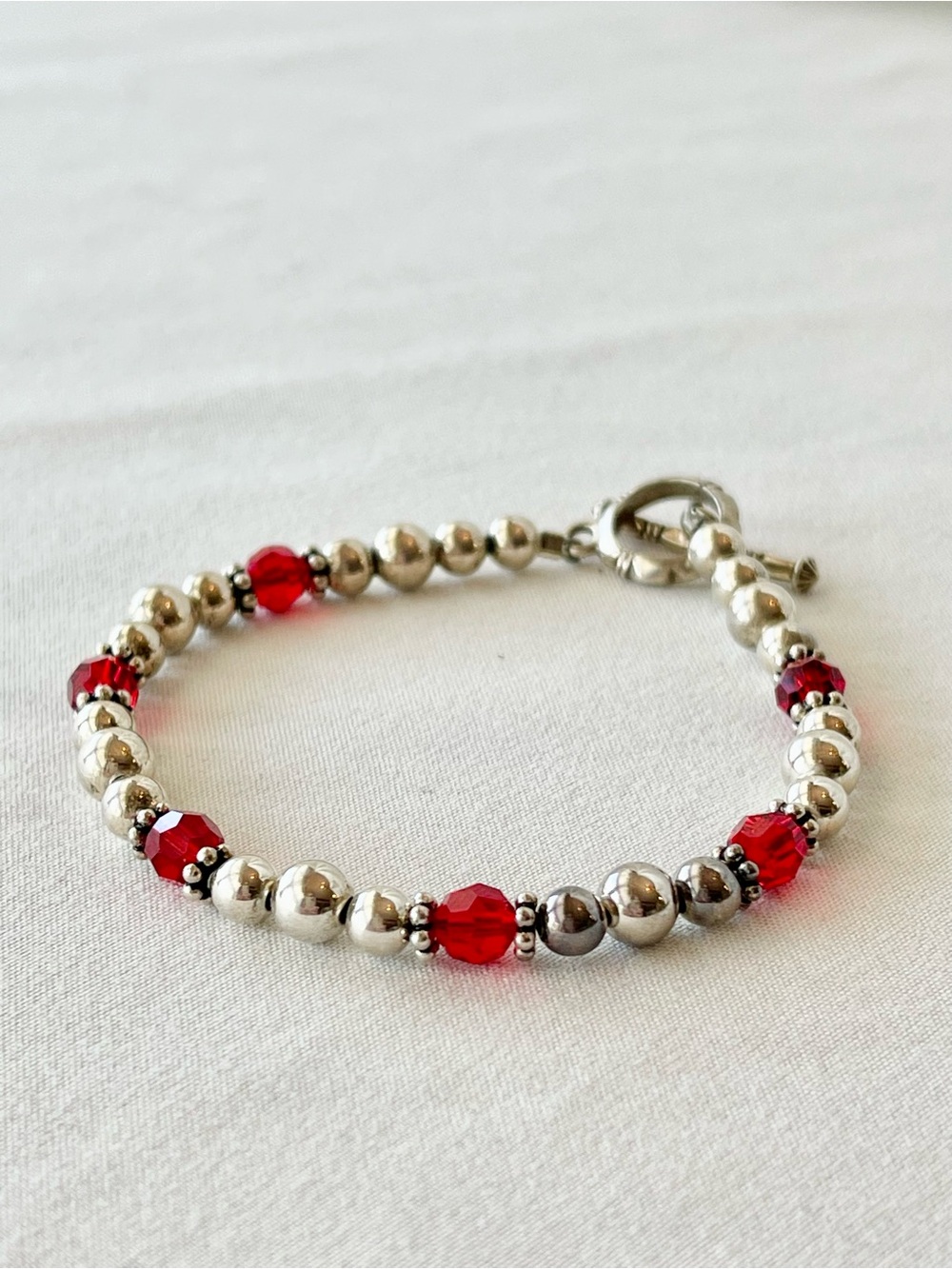 Handmade Sterling Silver Bead Bracelet with Red Crystal Accents